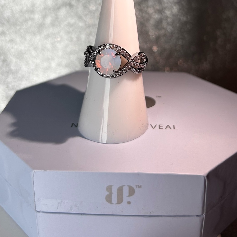 Sterling Silver Opal Halo Twist Ring - White Opal